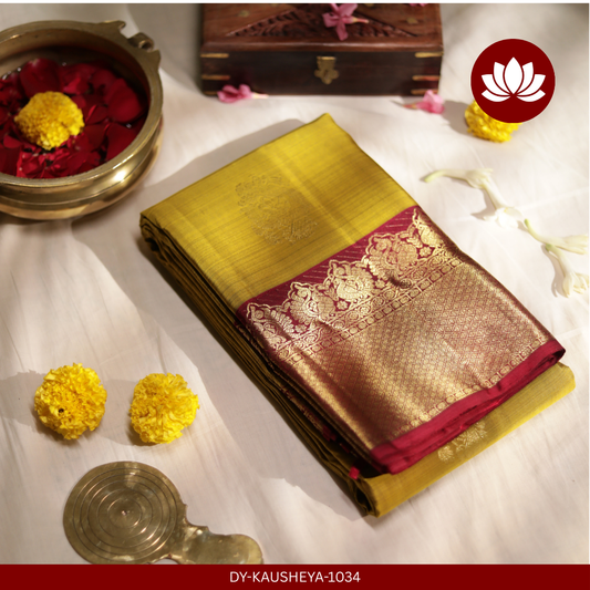 Lalitha Series: Leaf-Green Pure Silk Saree with a Thick Maroon Border